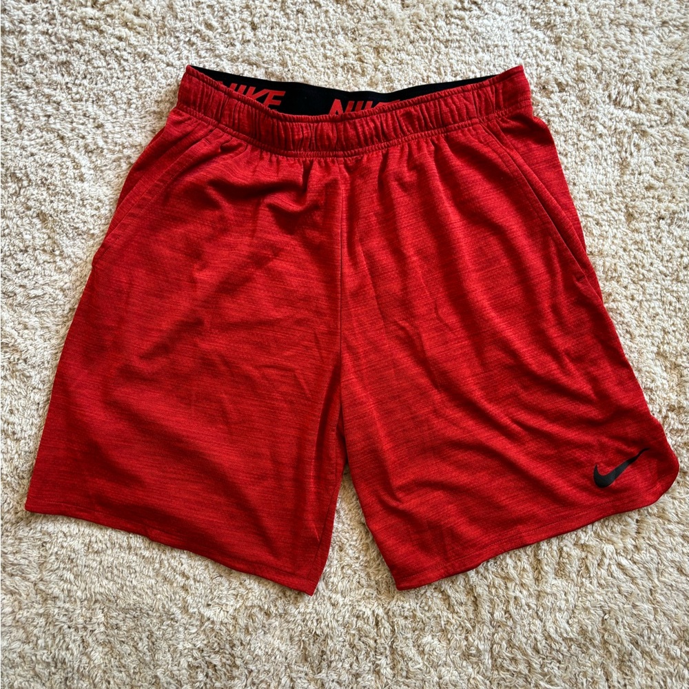 Nike dri-fit gym shorts. Size large. Red/orange. Great shorts, lightly worn.